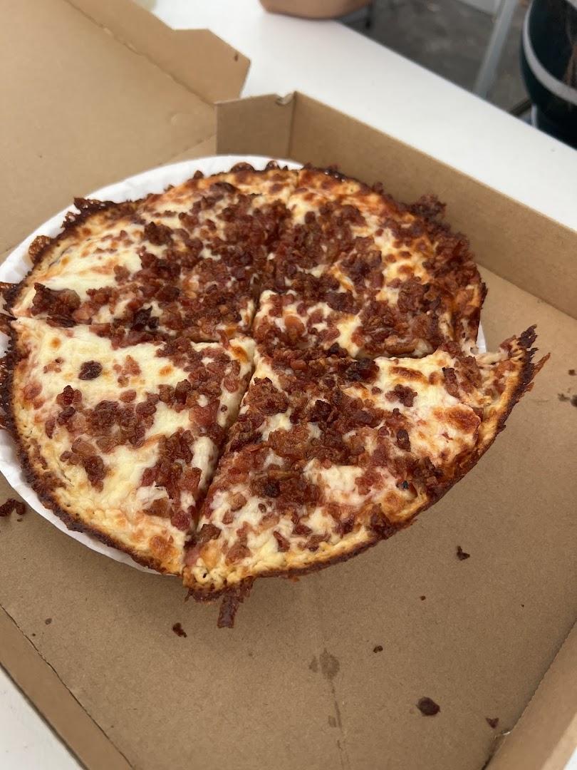 QUE VUELTA PIZZERIA