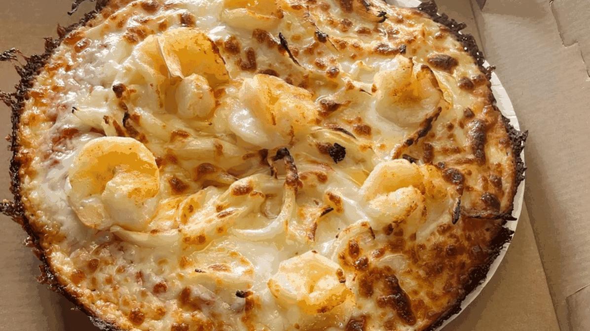 QUE VUELTA PIZZERIA