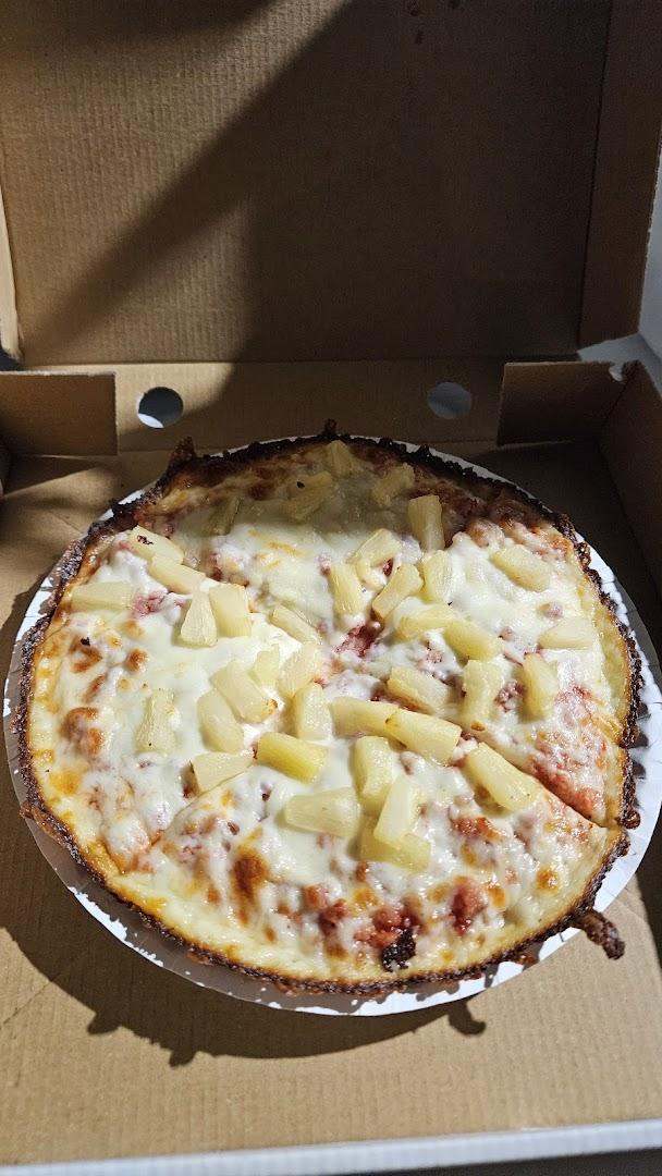 QUE VUELTA PIZZERIA